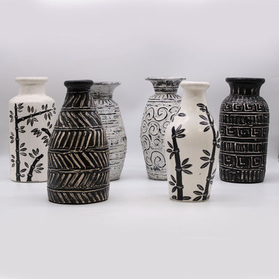 Check out our collection of stunning vases. Our vases make a beautiful home decorative piece and are perfect for arranging flowers. Made of glazed ceramic, terracotta, and sustainable natural glass and wood. 
