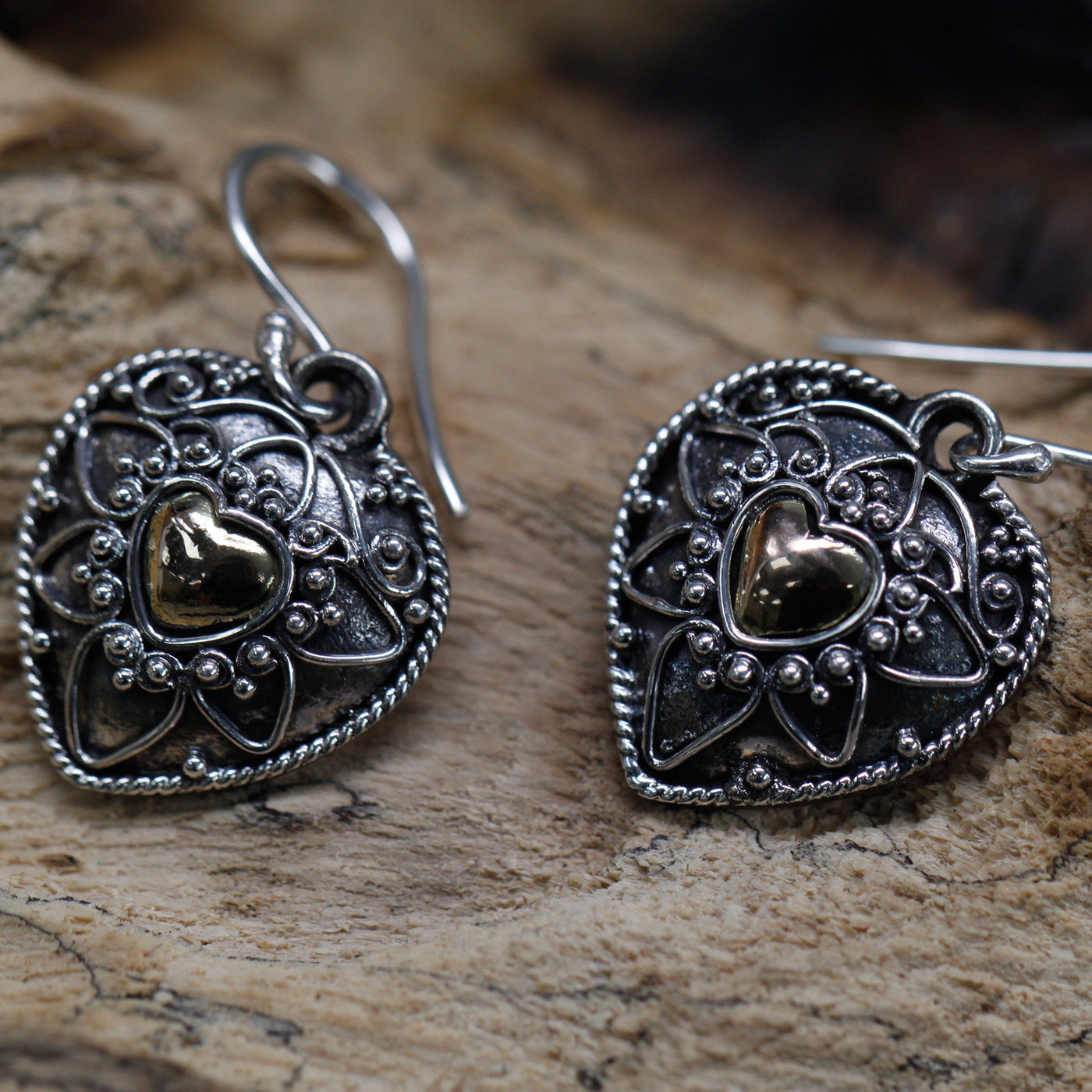 Women's Gold And Silver Heart Exotic Earrings.