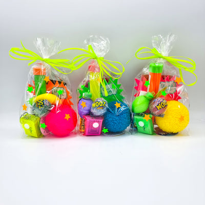 Neon glow pre filled party bags for boys and girls, with neon glow novelty toys and sweets for children