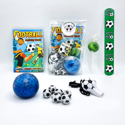 Pre filled football birthday party goody bags with toys and sweets for children.