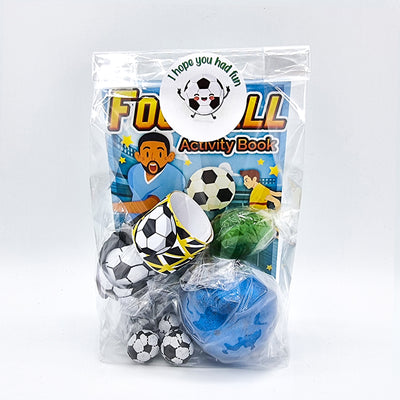 Pre filled football birthday party goody bags with toys and sweets for children. 