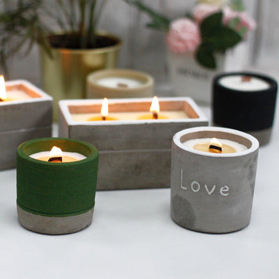 Fragranced Crushed Vanilla & Orange 3 Wooden Wicker Candle In A Large Round Concrete Pot.