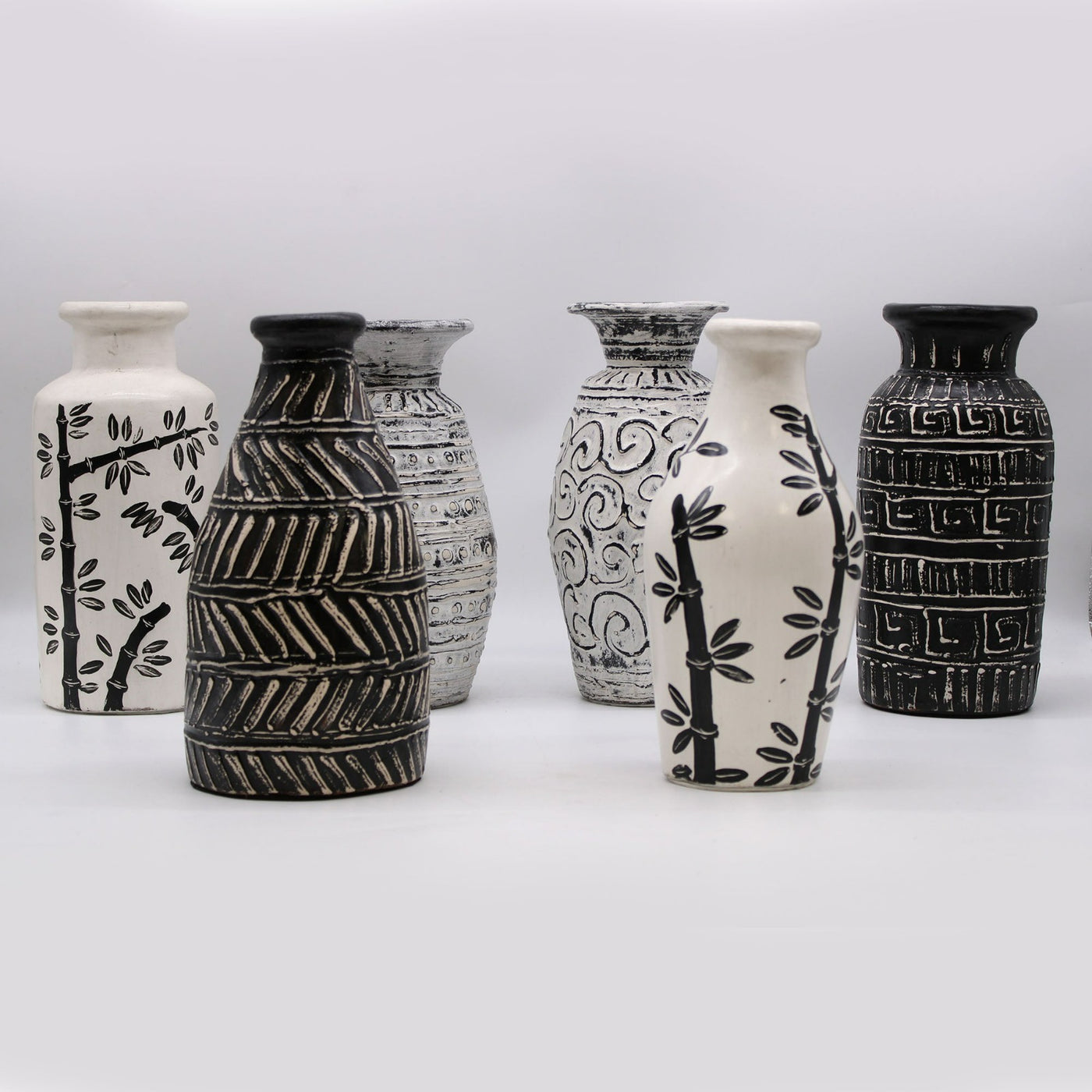 Natural Cream And Black Ceramic Bamboo Motif Shaped Vase.