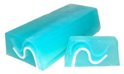 Hand made blue ocean soap loaf and slices with a fresh, clean ozone fragrance of a sea breeze, and a wave motif through the soap.