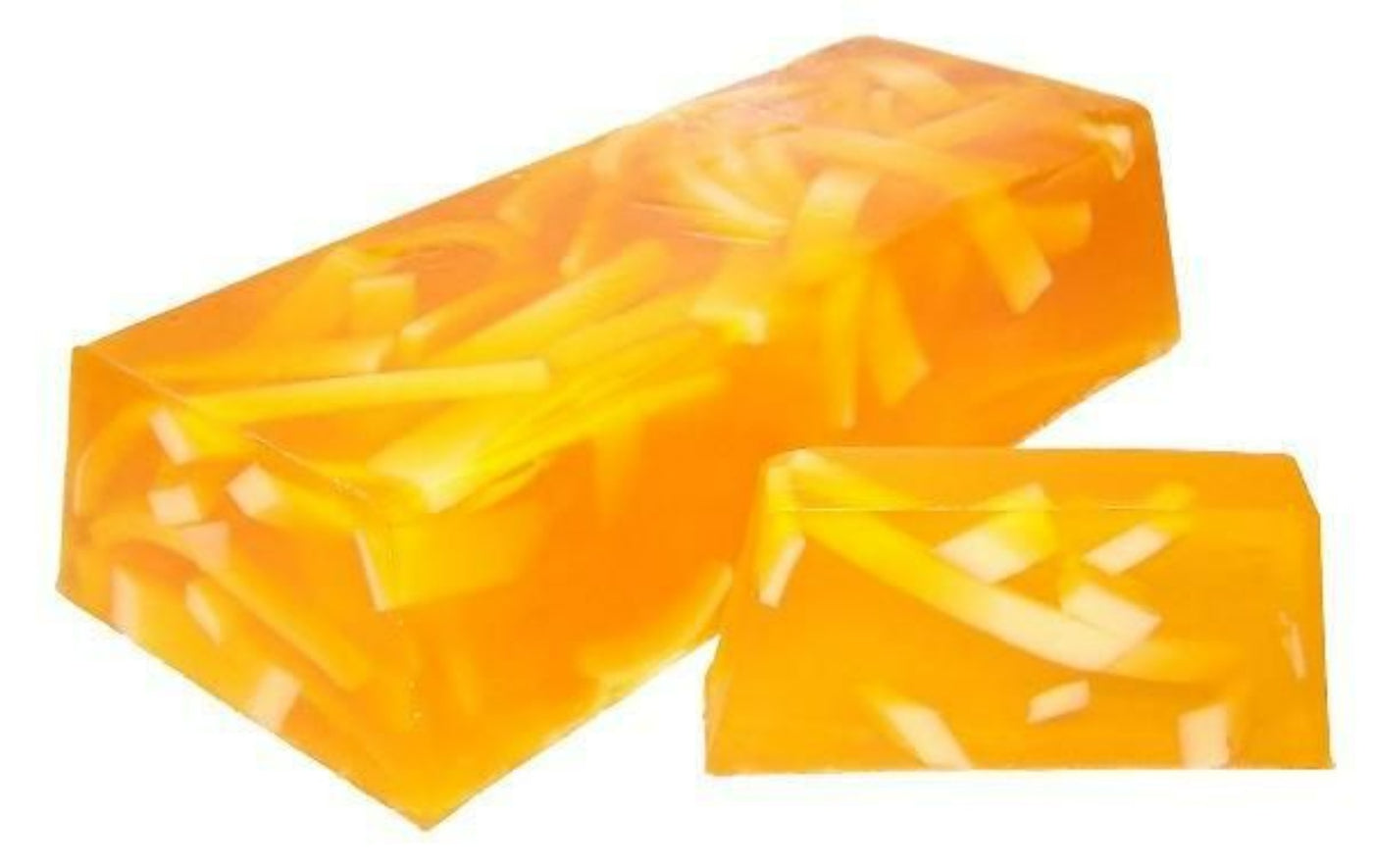 Hand made orange zest soap loaf and slices made with essential oil, with a sweet, zesty fragrance and is made with soap ribbons.