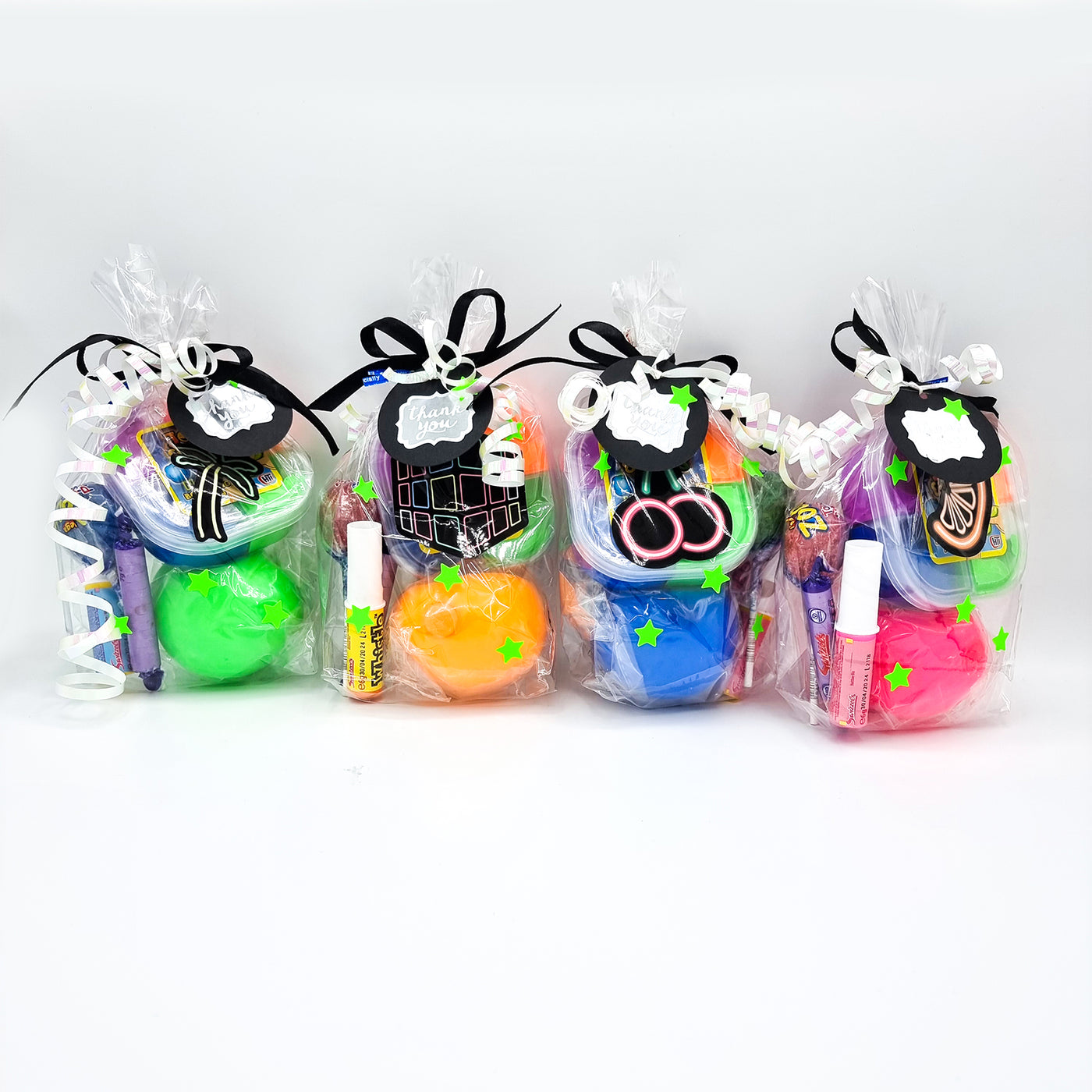 Neon Birthday Party Favours For Boys And Girls With Neon Toys And Sweets.