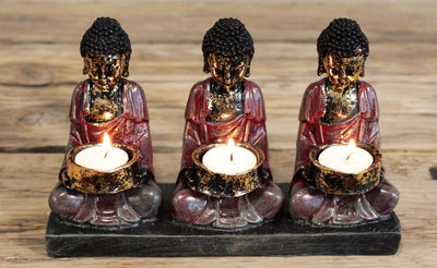 Three Antique Buddhas Tealight Candle Holder.