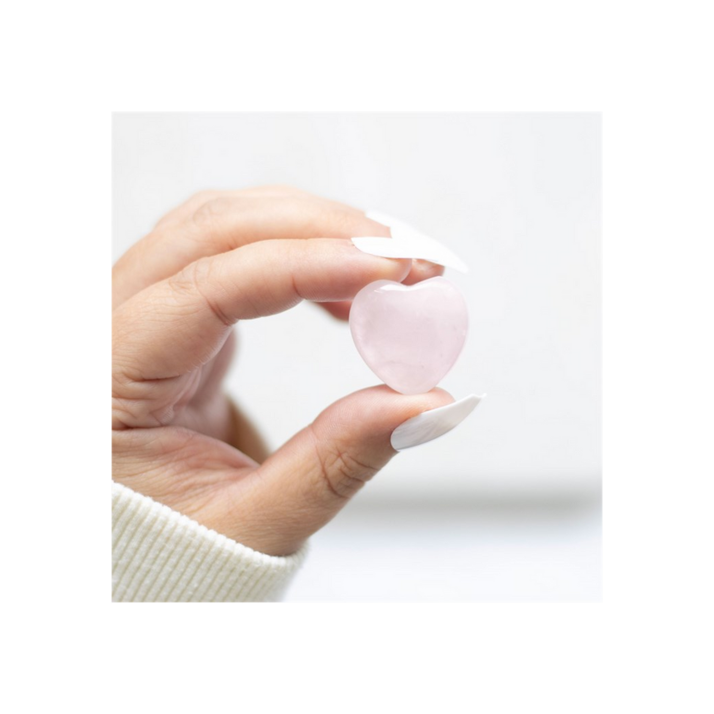 Rose Quartz Heart Shaped Gemstone Crystal Heart In A Drawstring Bag.