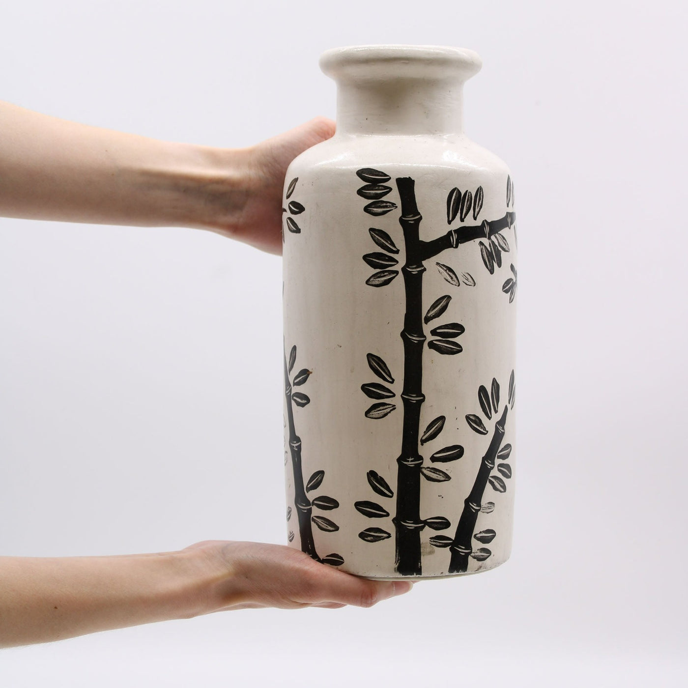 Natural Cream And Black Ceramic Bamboo Motif Cylinder Shaped Vase.